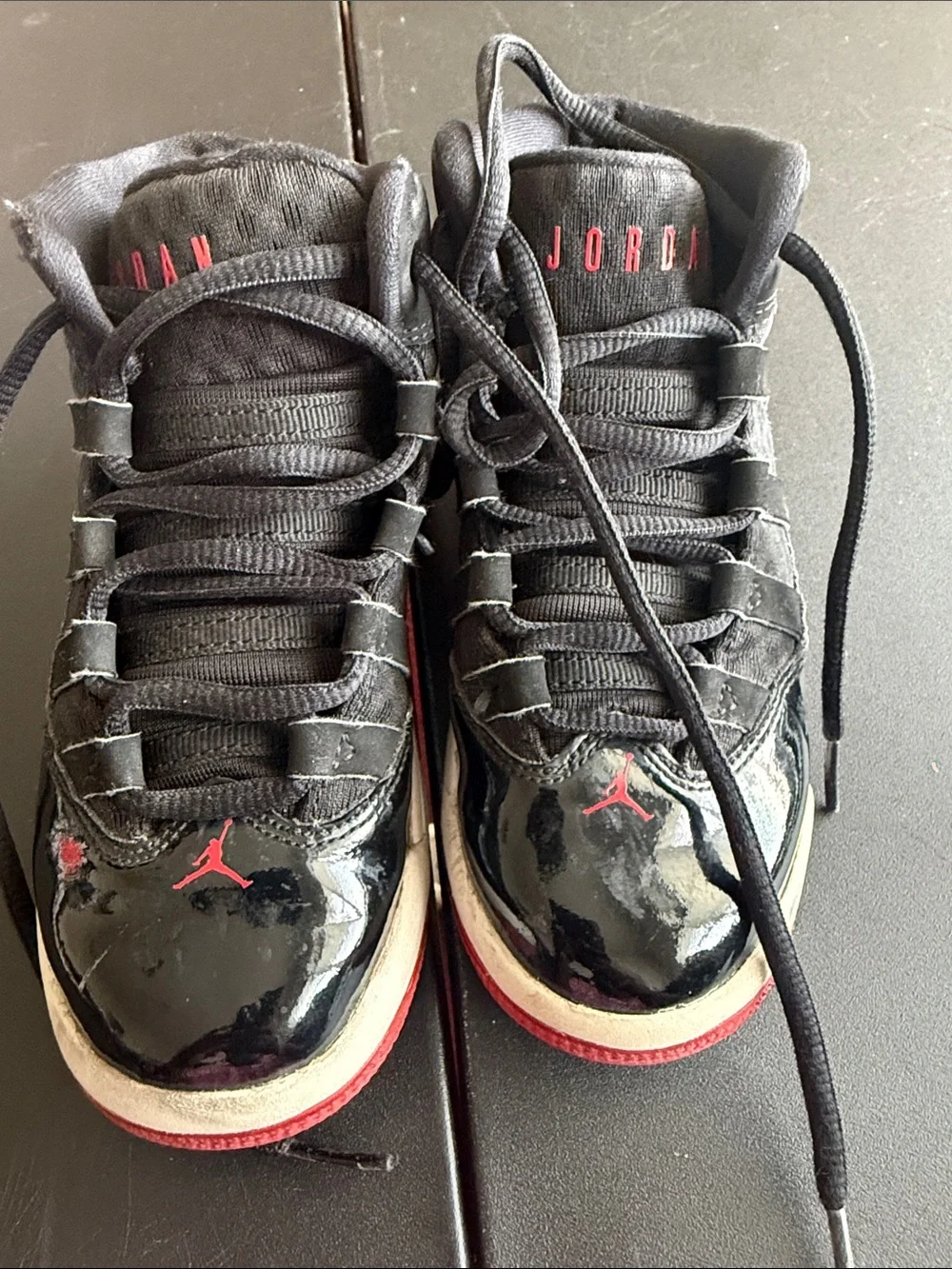 Jordan kids  Black Patent Leather Sneakers with Red Accents